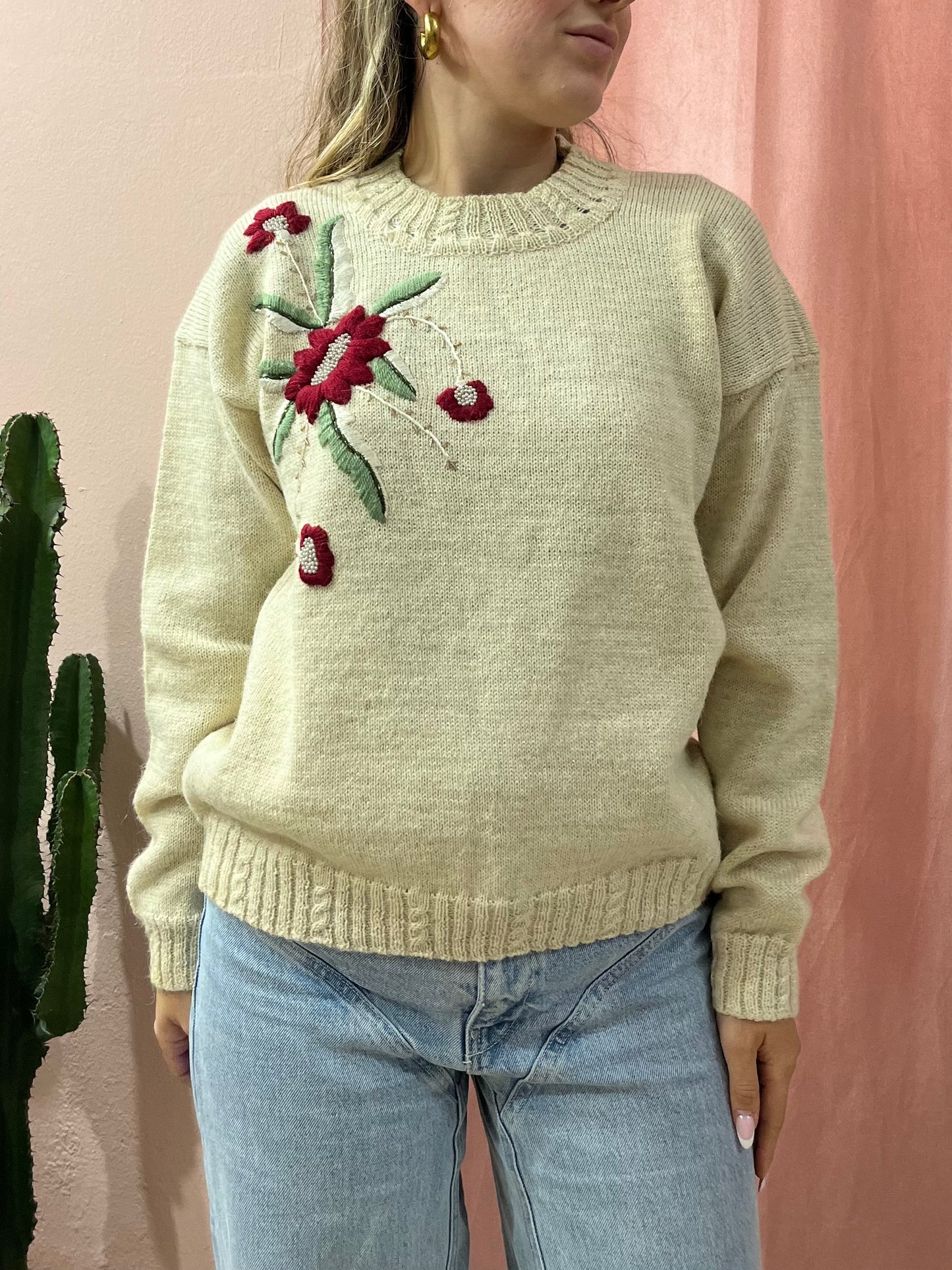 Maglione in lana panna con fiore